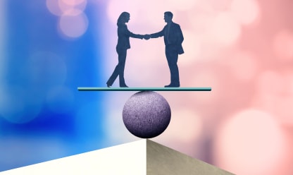 silhouette of 2 people shaking hands