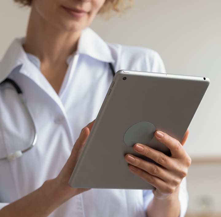 A person working on a tablet 