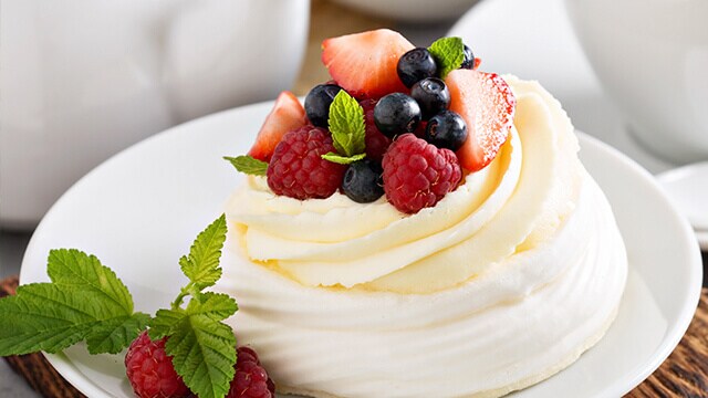 Cake with fruit on-top.