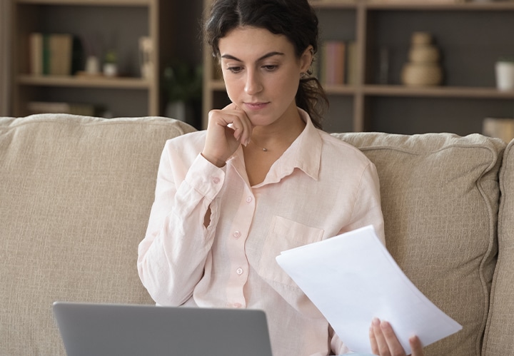 A person looking at a laptop